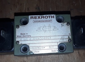 7 x Rexroth hydrauliek ventiel 4 WE6 J51/AG24N9Z4 